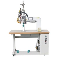 COMPUTERIZED MULTI-FUNCTION REINFORCEMENT SEAM TAPE PRESSING MACHINE